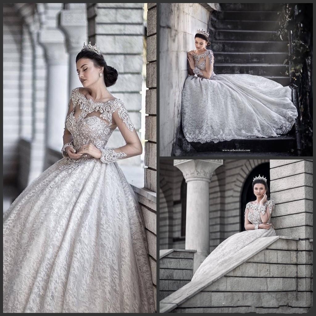 Modern Arabic Ball Gown Wedding Dresses Off Shoulder Long Sleeves Illusion Full Lace Appliques Crystal Beaded Plus Size Formal Bridal Gowns, White
Modern Arabic Ball Gown Wedding Dresses Off Shoulder Long Sleeves Illusion Full Lace Appliques Crystal Beaded Plus Size Formal Bridal Gowns, White