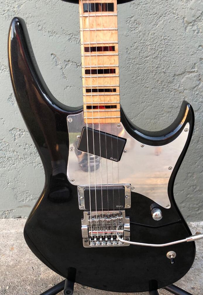 Rare Phantom GT Glenn Tipton Metallic Black Electric Guitar, Locking Nut & Kahler Tremolo Bridge, Mirror Pickguard, Copy EMG Pickups
Rare Phantom GT Glenn Tipton Metallic Black Electric Guitar, Locking Nut & Kahler Tremolo Bridge, Mirror Pickguard, Copy EMG Pickups