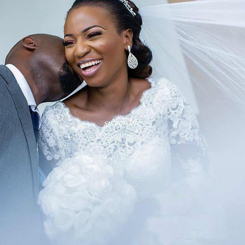 African Mermaid Wedding Dresses Long Sleeves Lace Appliques Beaded Court Train Organza Ruffles Tiered Bridal Gowns