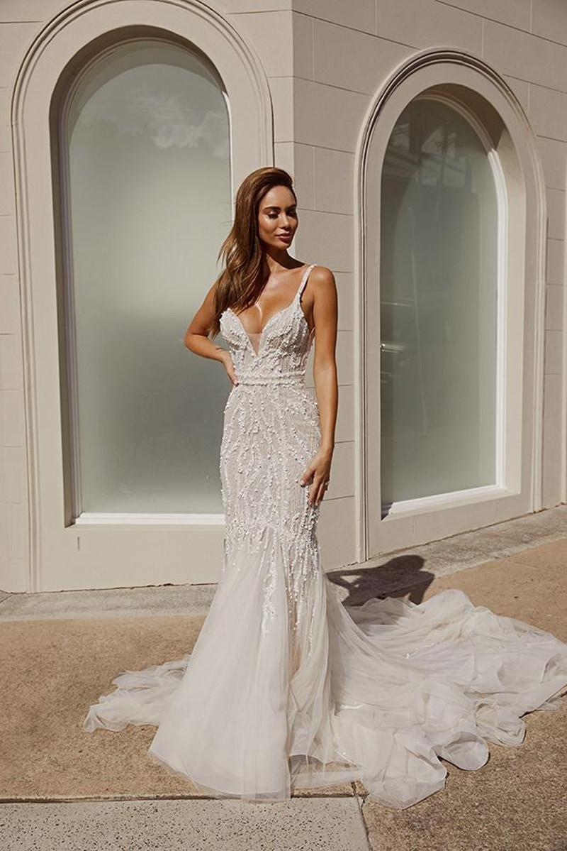 2020 charming Wedding Dresses Spaghetti Straps Lace Beads Sequins Bridal Gowns Sexy Open Backless Sweep Train Mermaid Wedding Dress