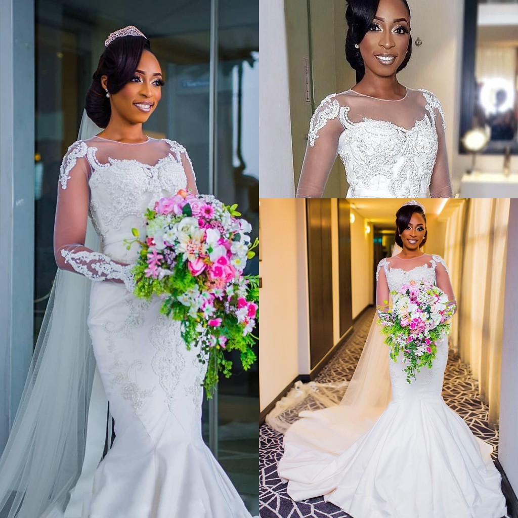 African Long Sleeves Mermaid Wedding Dresses Jewel Neck Illusion Lace Appliques Crystal Beads Court Train Plus Size Formal Bridal Gowns