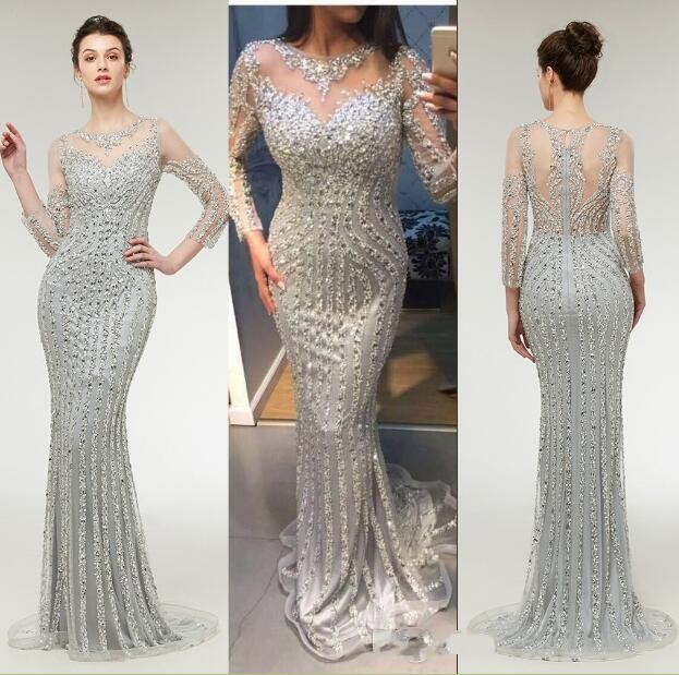 2020 Bling Arabic Sexy Silver Evening Dresses Wear Jewel Neck Illusion Long Sleeves Crystal Beading Plus Size Pageant Party Dress Prom Gowns, Same as picture
2020 Bling Arabic Sexy Silver Evening Dresses Wear Jewel Neck Illusion Long Sleeves Crystal Beading Plus Size Pageant Party Dress Prom Gowns, Same as picture