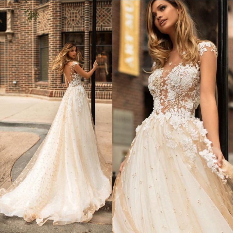 2020 Champagne Lace Wedding Dresses Pearls Beading Formal A Line Boho Backless Illusion Bodice Bridal Gowns, Silver
2020 Champagne Lace Wedding Dresses Pearls Beading Formal A Line Boho Backless Illusion Bodice Bridal Gowns, Silver