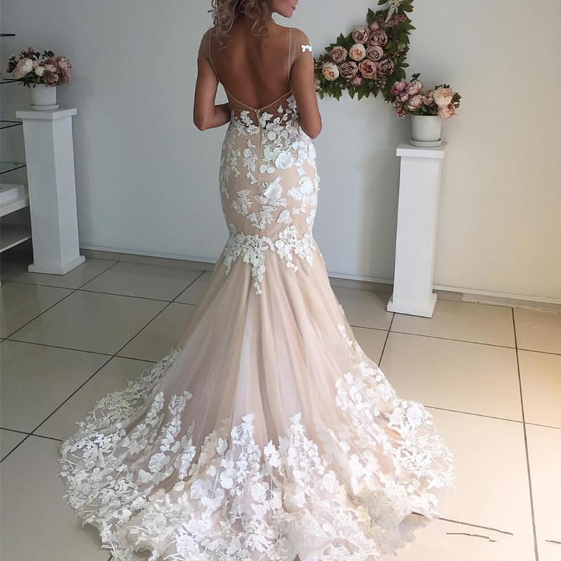 Mermaid Bridal Gowns Lace Appliqued Cap Sleeves Sexy Nude Pink Wedding Dresses Lace Off Shoulder robes de mariee robe de mariages