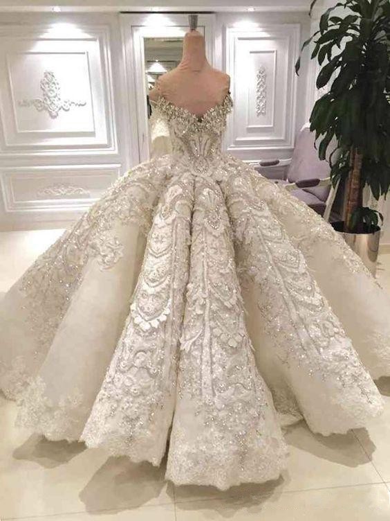 2019 Luxury Dubai Wedding Dress Ball Gown Off the Shoulder Sparkly Crystals Beads Lace Appliques Arabic Bridal Gowns with Long Train, Same as image
2019 Luxury Dubai Wedding Dress Ball Gown Off the Shoulder Sparkly Crystals Beads Lace Appliques Arabic Bridal Gowns with Long Train, Same as image
