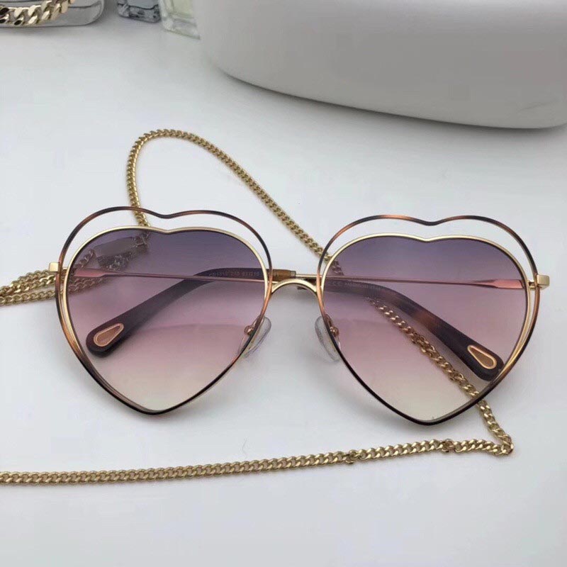 Luxury-New fashion designer women sunglasses Heart-shaped Hollow frame with frame clear colored lens ultra-light eyewear 131
Luxury-New fashion designer women sunglasses Heart-shaped Hollow frame with frame clear colored lens ultra-light eyewear 131
