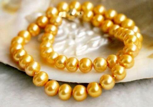 925 sterling silver hot yellow gold 18 "9-10MM real australian gold South Sea pearl necklace
925 sterling silver hot yellow gold 18 "9-10MM real australian gold South Sea pearl necklace