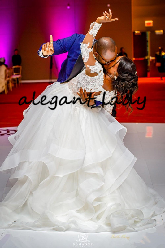 Plus Size Long Sleeve Wedding Dresses 2020 Modern V-neck Lace Applique Puffy Tiered Skirt Princess African Church Wedding Gown