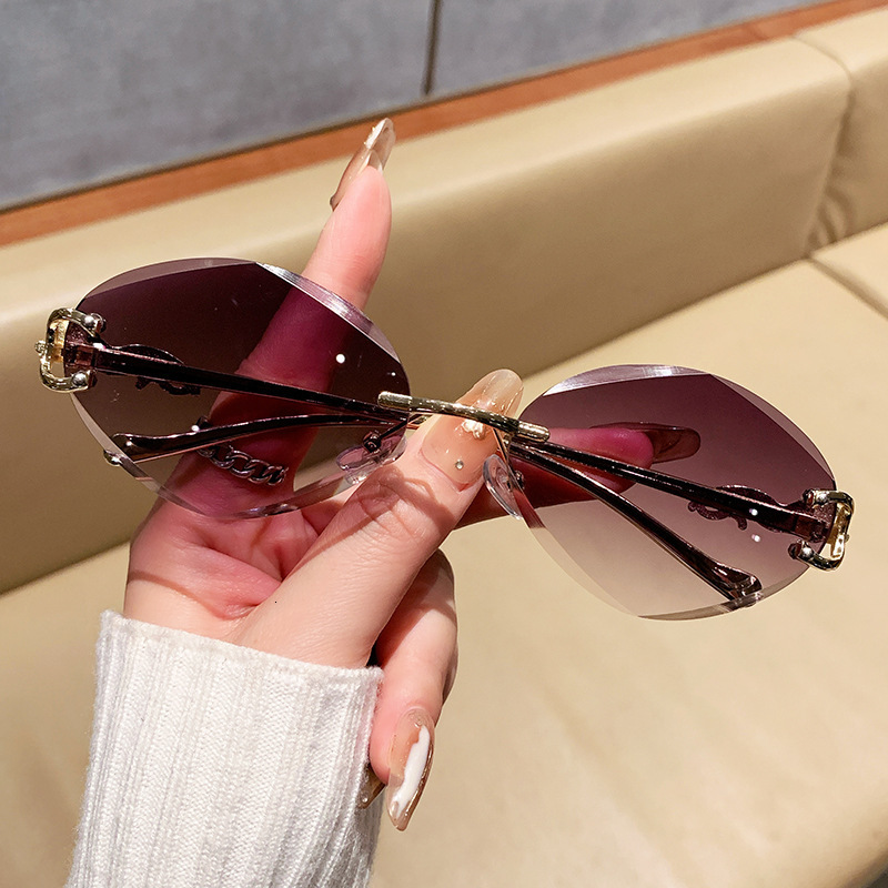 High-End Designer Sunglasses Leopard Head Frameless Oval Personality European And American Internet Celebrity Women's Sun Protection High-End Sun
