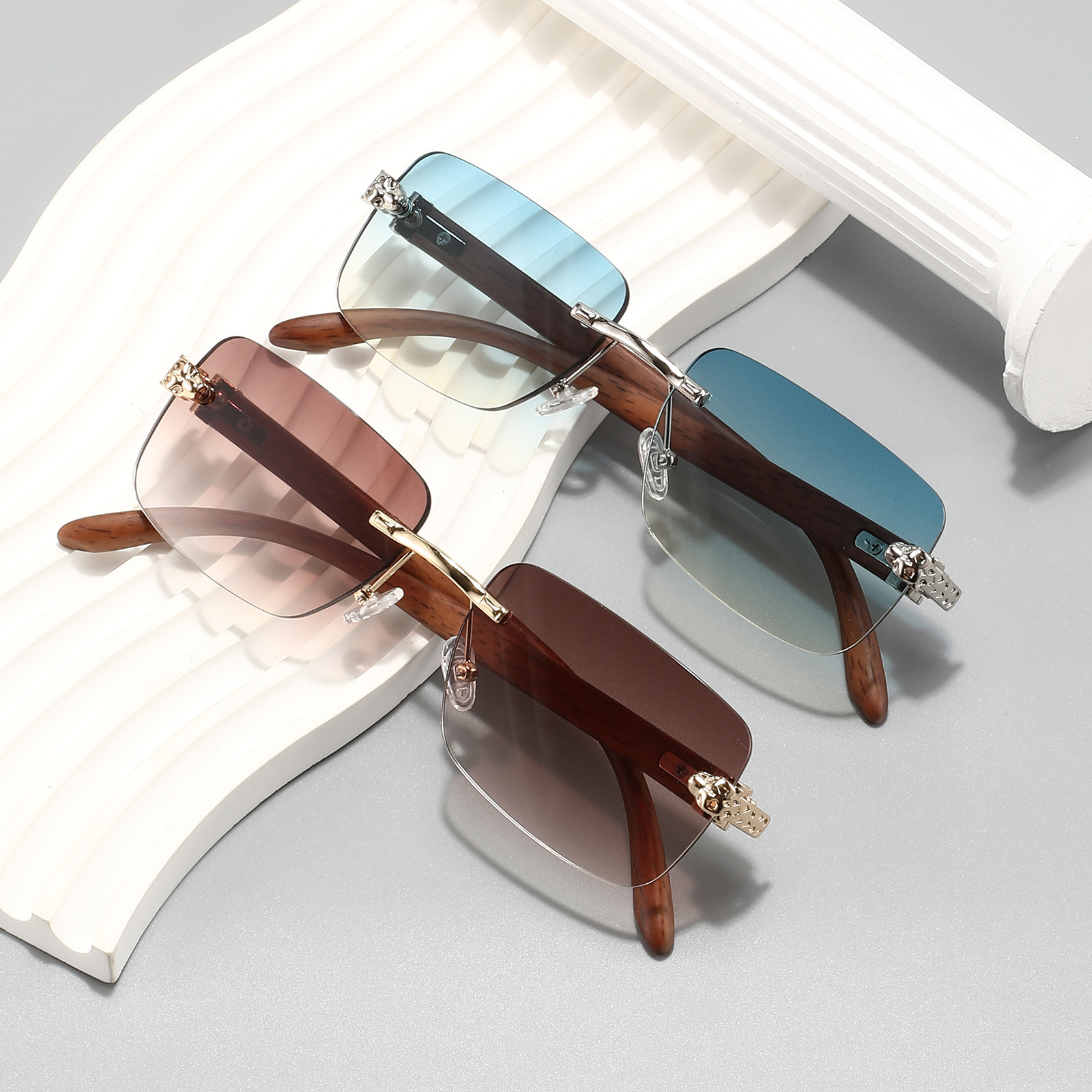 Luxury Fashion Designer Sunglasses New Frameless Leopard Head Fashion Imitation Wood Grain Sunglasses European And American Retro High-End Feel Unisex - view 3