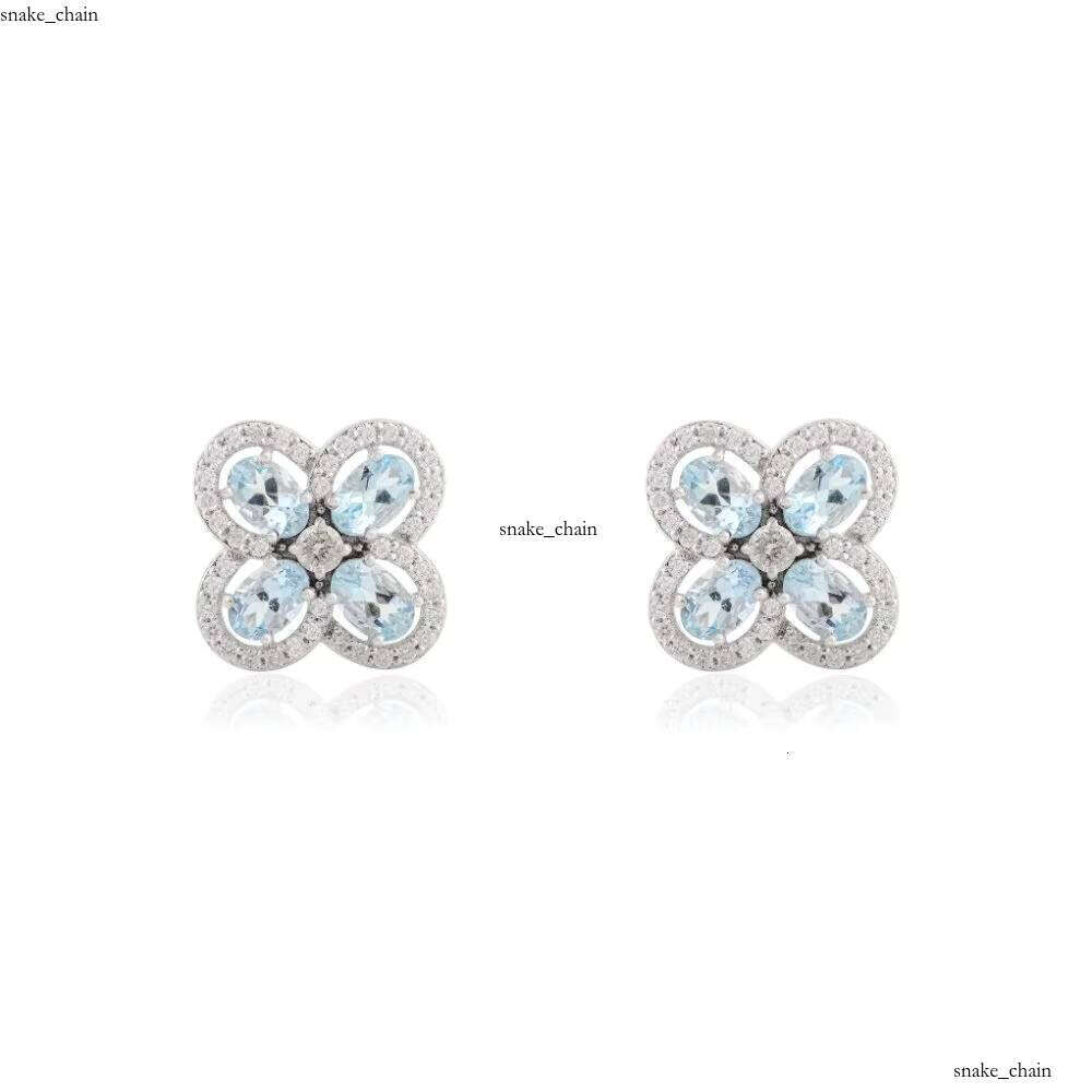 Bestselling Elegant Modern Flower Earrings with Natural Oval Cut Aquamarine and VVS Moissanites & 14k Pure White Gold Jewelry