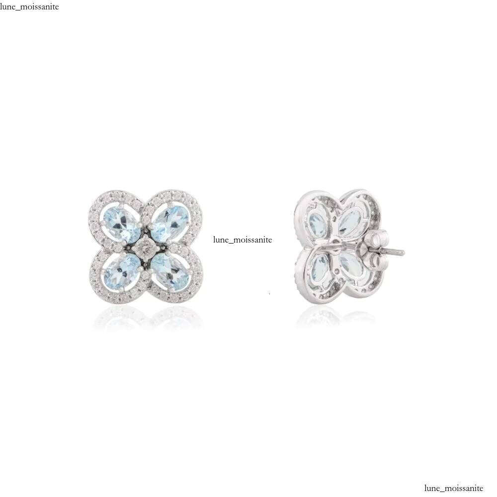 Bestselling Elegant Modern Flower Earrings with Natural Oval Cut Aquamarine and VVS Moissanites & 14k Pure White Gold Jewelry