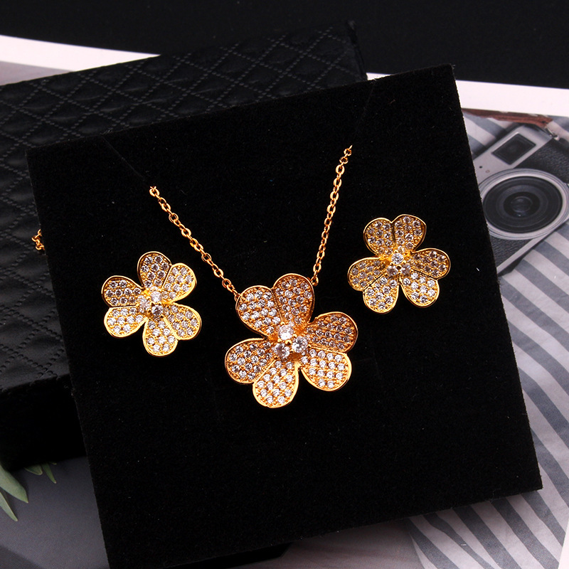 Style Fresh Creative Plum Blossom Full Diamond Necklace And Earrings Set Fashionable Versatile Women's Light Luxury Jewelry