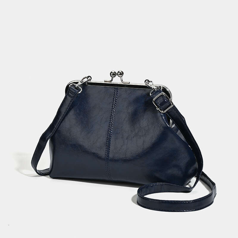 Japanese and Korean Cross-Border Solid Color Clip Fashion New Versatile Commuter Handbag Bucket Single Shoulder Crossbody Bag
