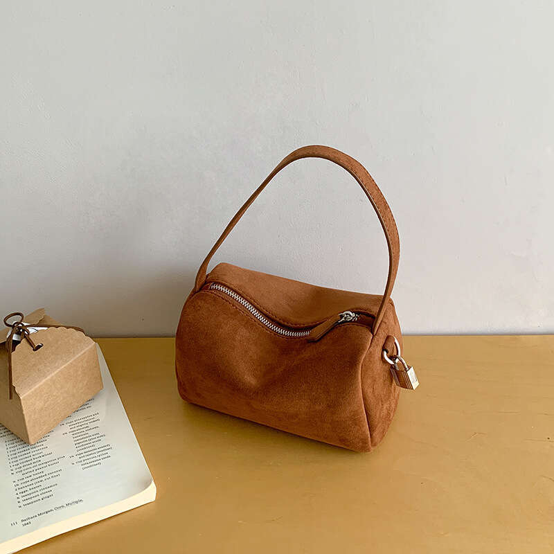 Cross-Border Korean Style Pillow 2025 Winter New Niche Handheld Cylinder Tote Solid Color Matte Suede Bag for Women