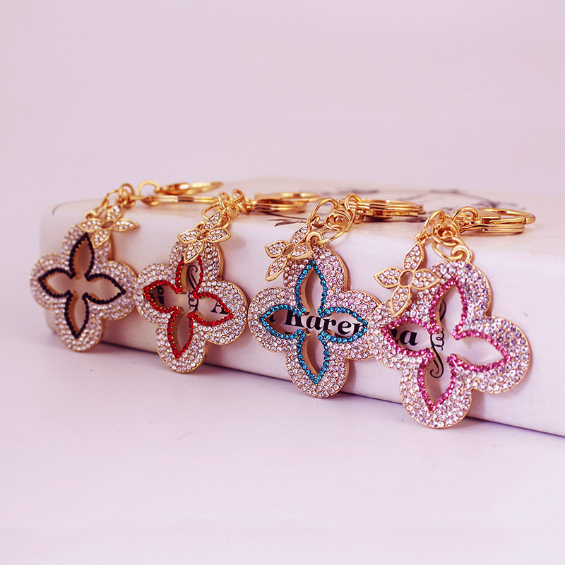 Luxury Brand Designer Jewelry Full Diamond Exquisite Four-Leaf Clover Alloy Keychain Accessory Key Chain For Girlfriend Bag Buckle Bag Pendant 1300