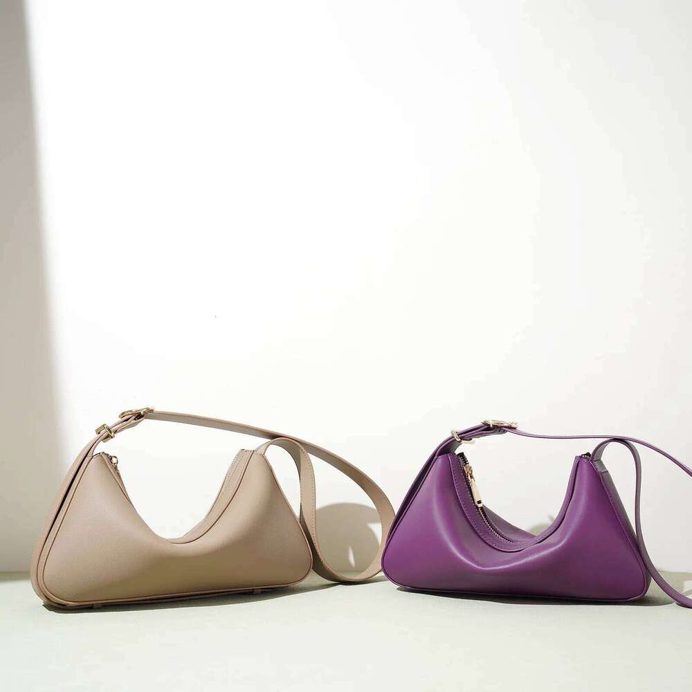 Cowhide Women's Crescent New Niche Design Simple Commuter Crossbody Fashionable High Quality Armpit Shoulder Bag Suotong251222