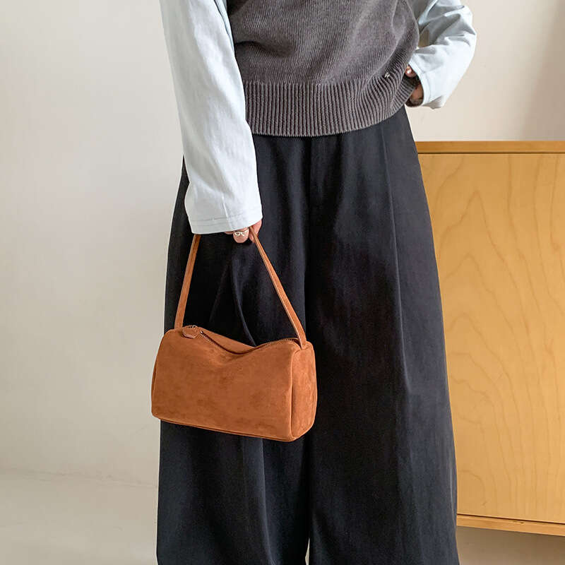 Cross-Border Korean Style Pillow 2025 Winter New Niche Handheld Cylinder Tote Solid Color Matte Suede Bag for Women