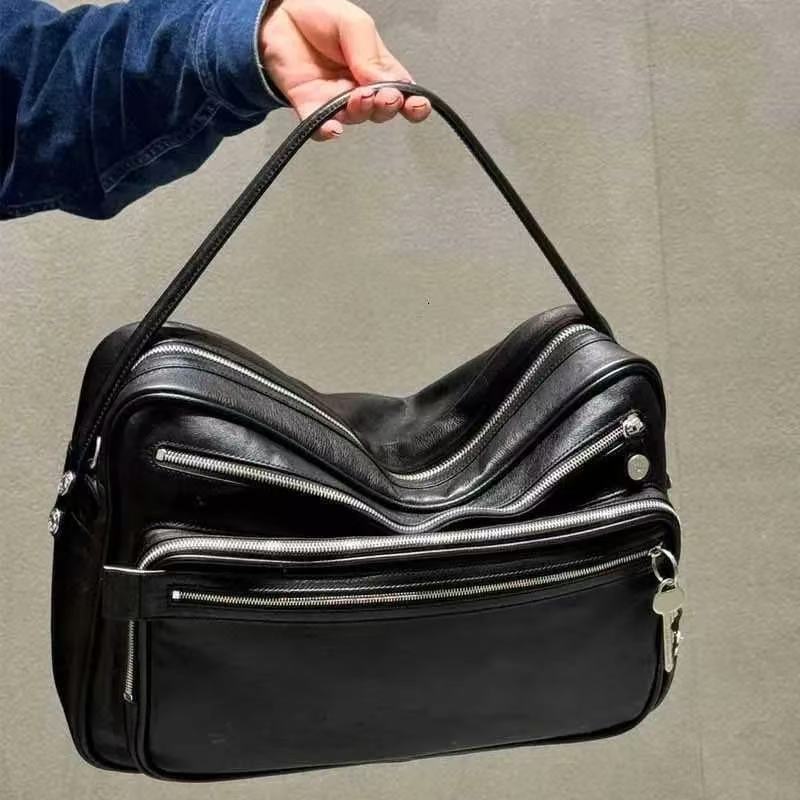 High-end genuine leather single-shoulder bag, unisex, with zipper lock, travel multi-compartment, motorcycle tote bag, keychain bag, crossbody bag, un