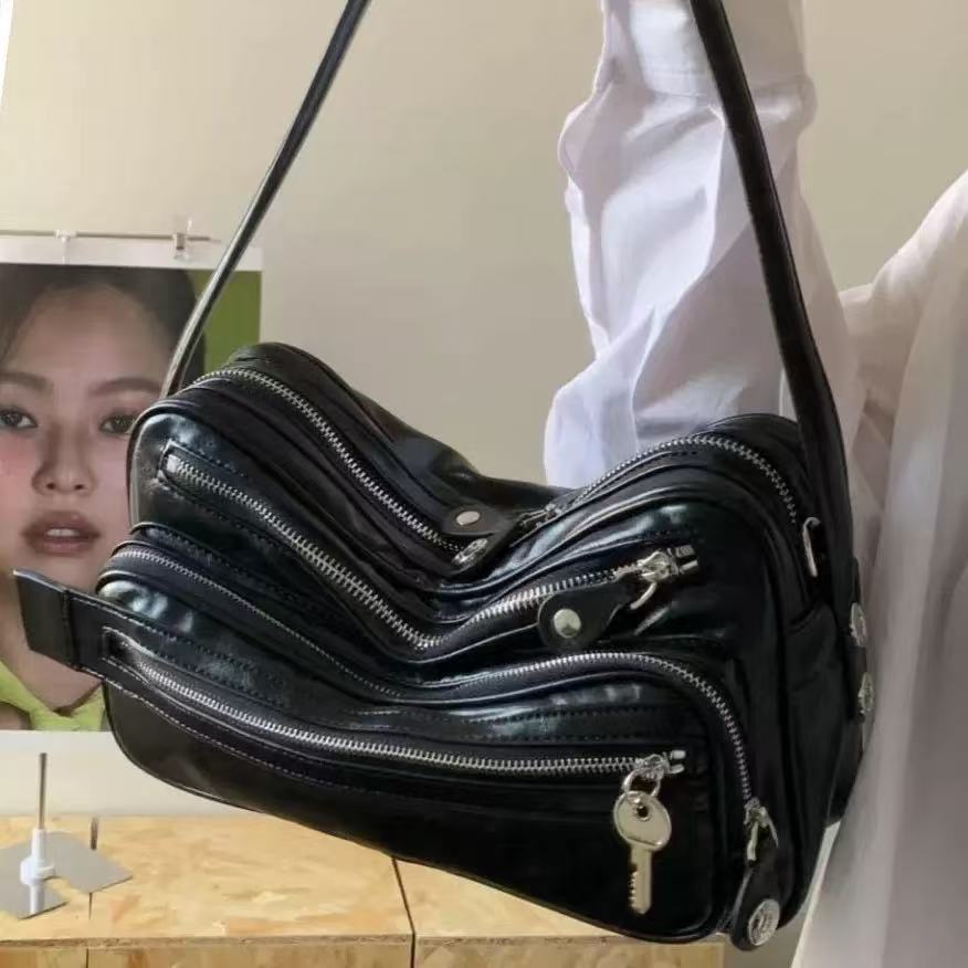 High-end genuine leather single-shoulder bag, unisex, with zipper lock, travel multi-compartment, motorcycle tote bag, keychain bag, crossbody bag, un