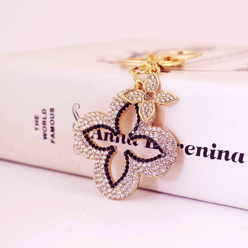 Luxury Brand Designer Jewelry Full Diamond Exquisite Four-Leaf Clover Alloy Keychain Accessory Key Chain For Girlfriend Bag Buckle Bag Pendant 1300