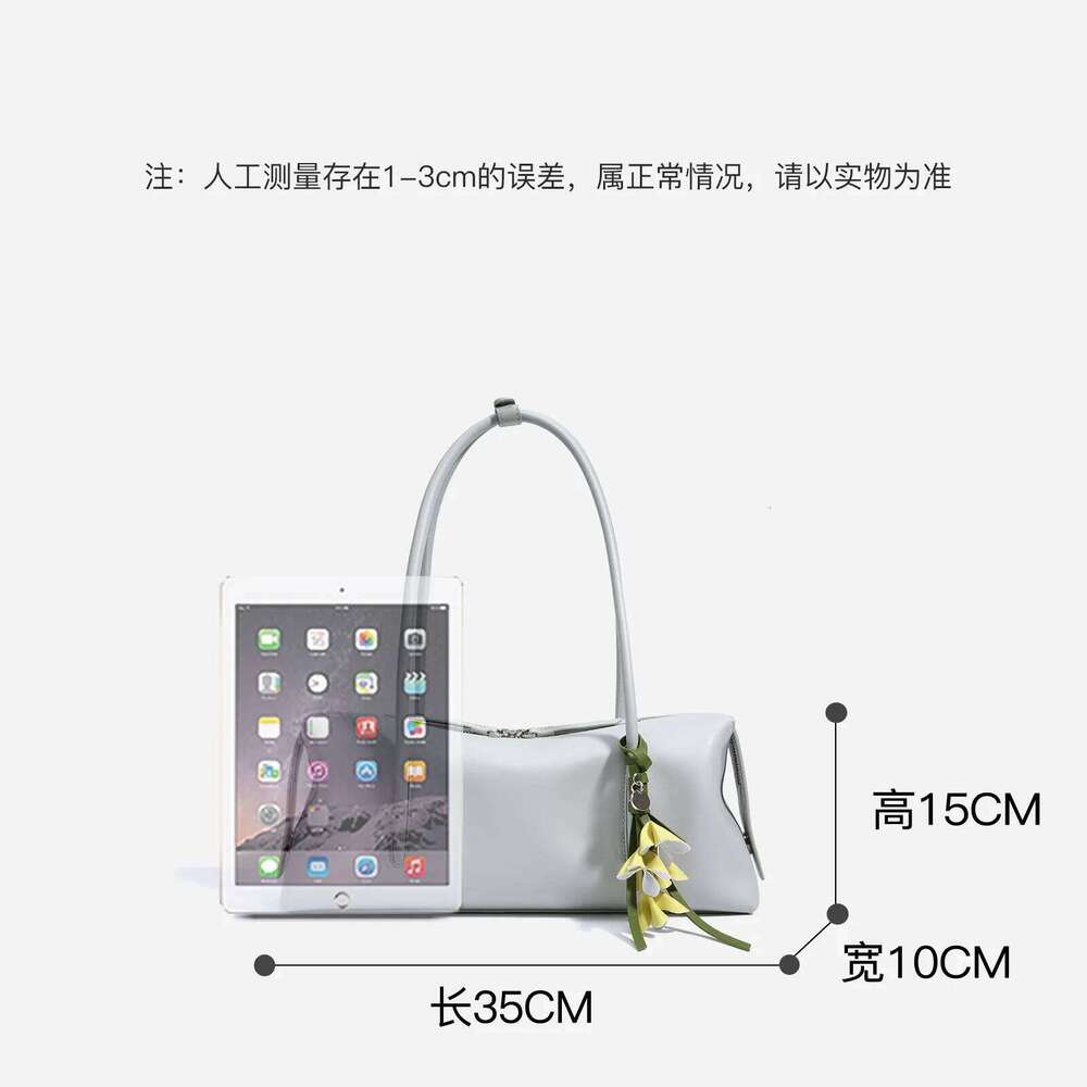 Cowhide Ladies Handbag New Niche Design Simple Casual Large Capacity Underarm Strap Pendant Fashionable Shoulder Bag Suotong251222