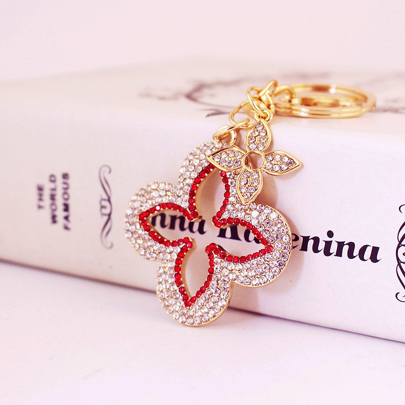 Luxury Brand Designer Jewelry Full Diamond Exquisite Four-Leaf Clover Alloy Keychain Accessory Key Chain For Girlfriend Bag Buckle Bag Pendant 1300