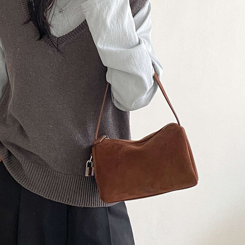 Cross-Border Korean Style Pillow 2025 Winter New Niche Handheld Cylinder Tote Solid Color Matte Suede Bag for Women