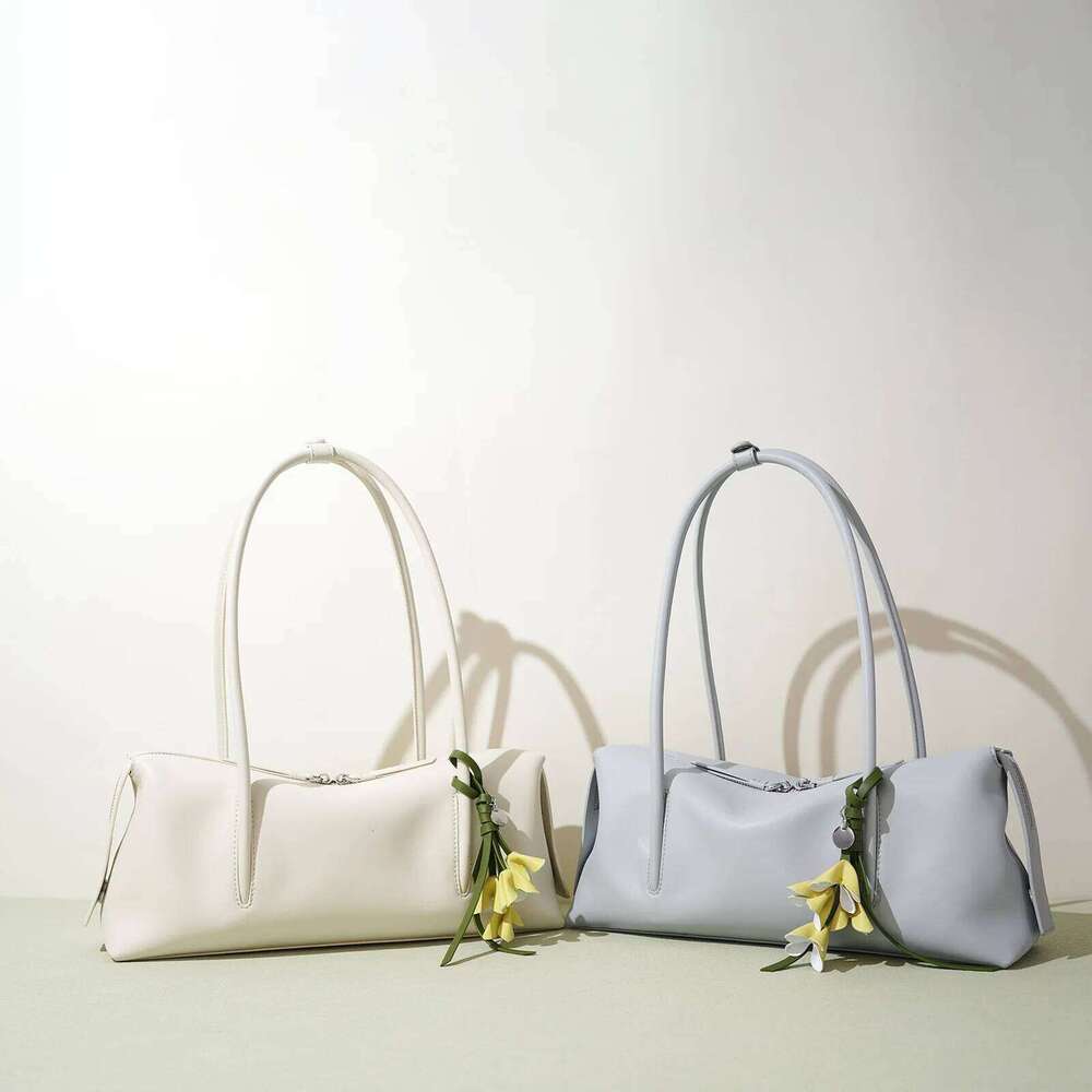 Cowhide Ladies Handbag New Niche Design Simple Casual Large Capacity Underarm Strap Pendant Fashionable Shoulder Bag Suotong251222