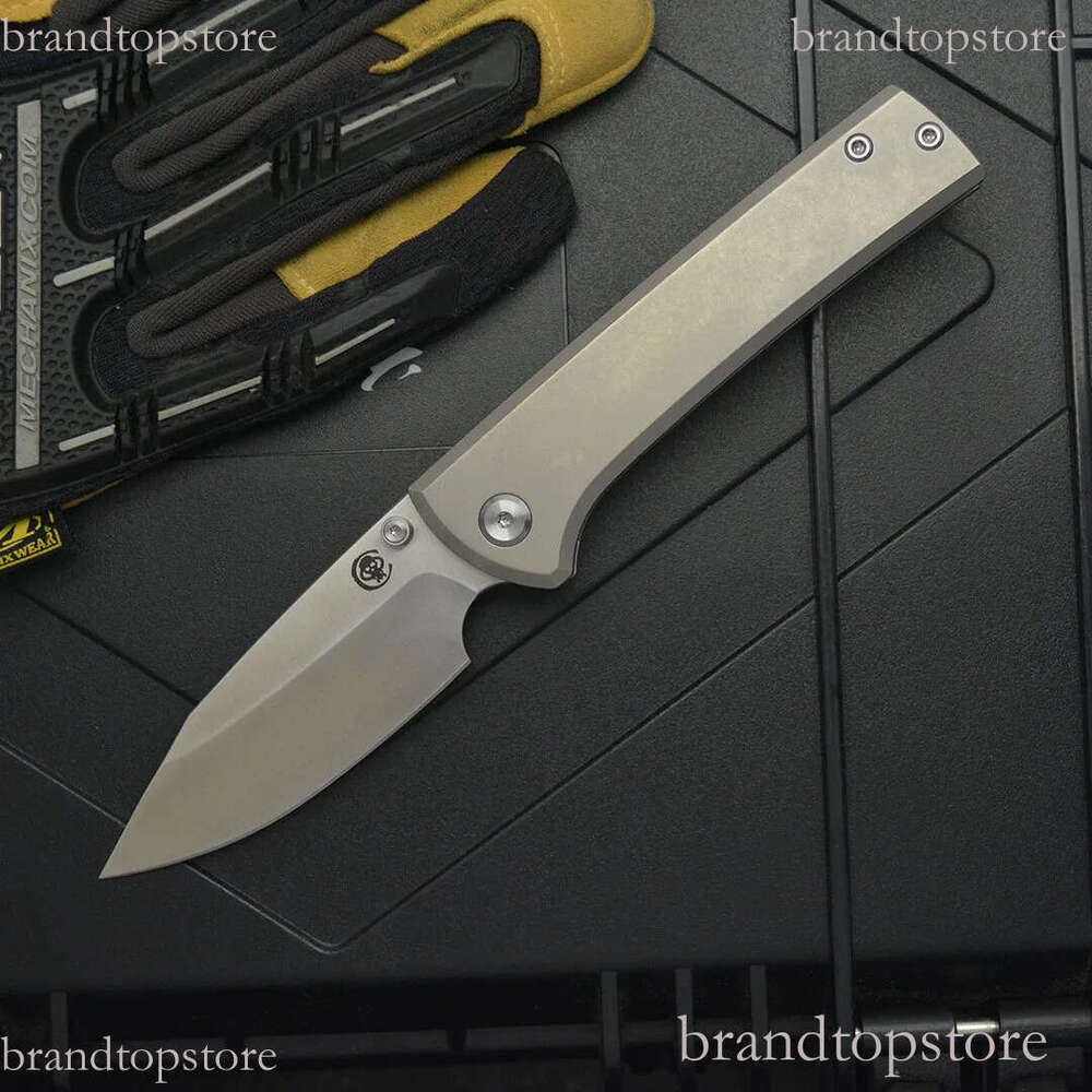 2Models Edition Chaves Folding Knife 3.23 M390 Satin Clip Point Blade, Titanium Handles