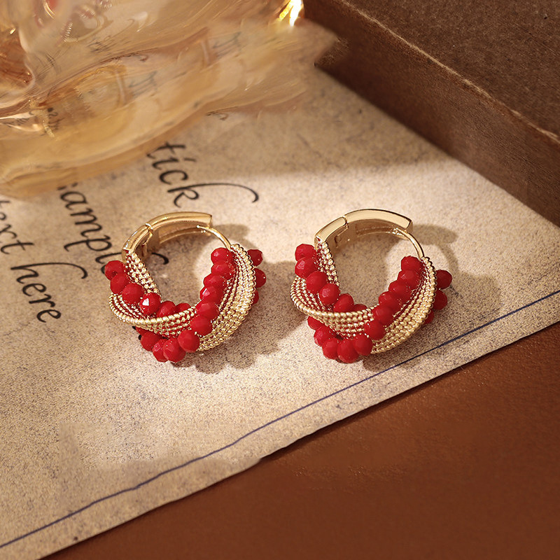 New crystal bead twisted ear buckle, personalized fashion design, niche temperament earrings, light luxury high-end earrings