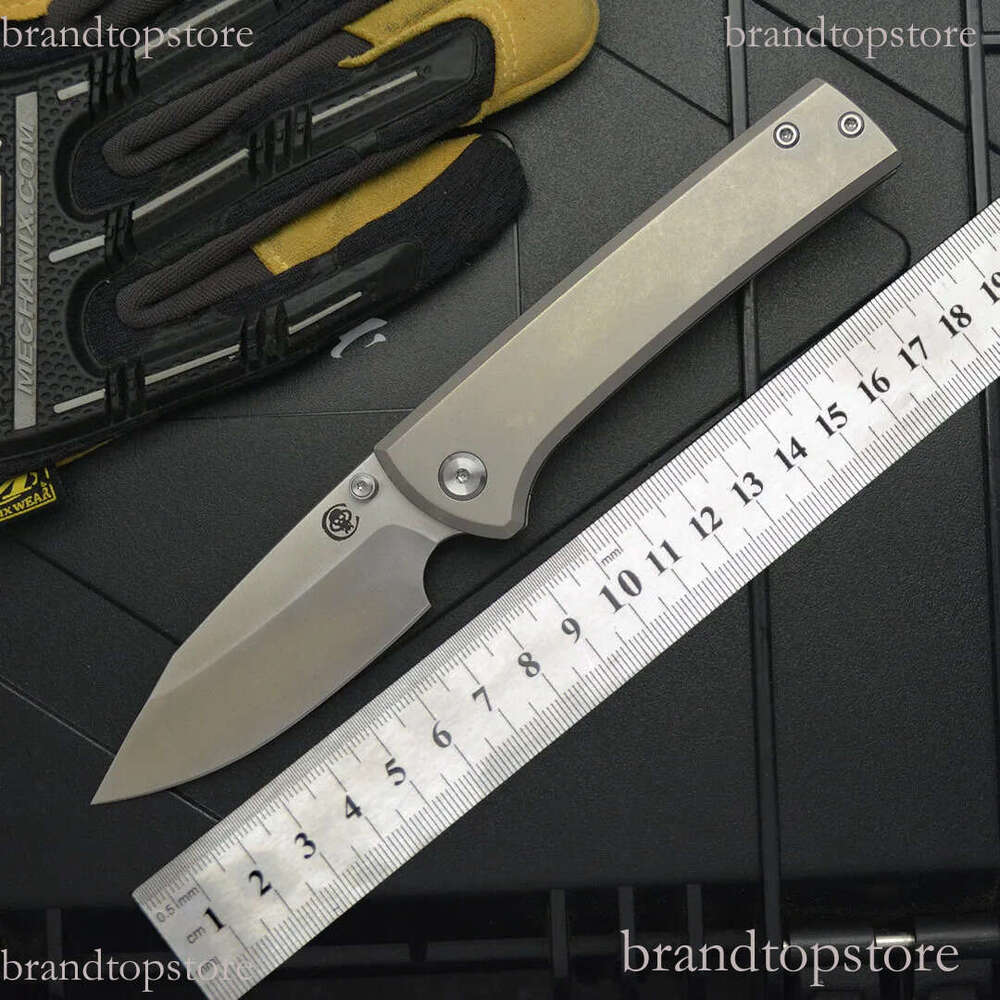 2Models Edition Chaves Folding Knife 3.23 M390 Satin Clip Point Blade, Titanium Handles