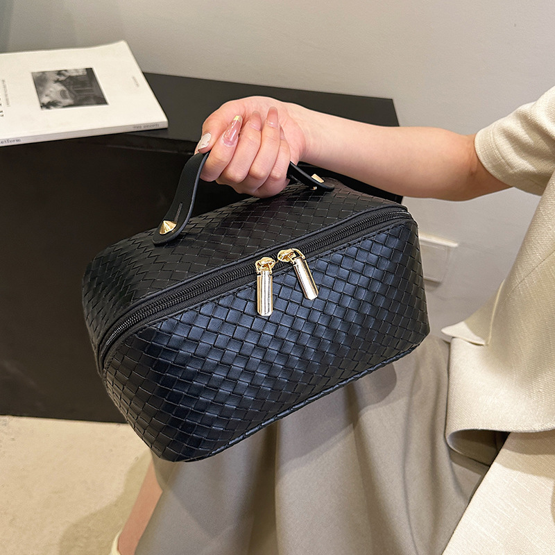 2026s New style woven pattern makeup bag for women large capacity portable high-end super popular travel makeup and toiletries storage bag