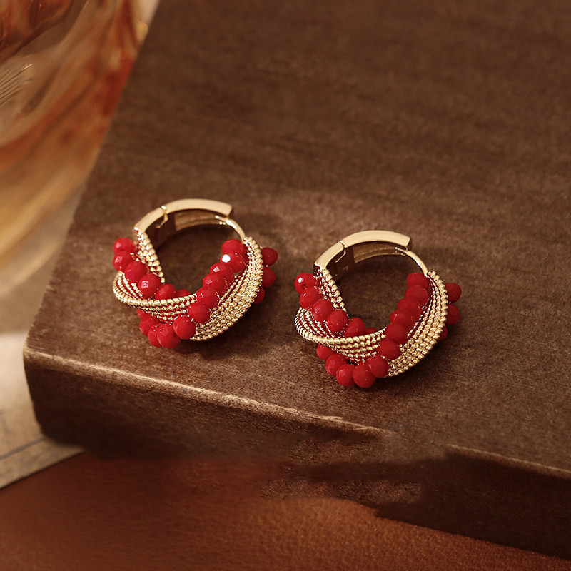 New crystal bead twisted ear buckle, personalized fashion design, niche temperament earrings, light luxury high-end earrings