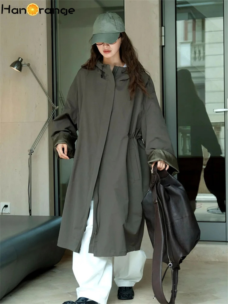 HanOrange 2024 Autumn Leisure Hooded Silhouette Windbreaker Women Windproof Long Trench Jacket Military GreenBeige Apricot 251231