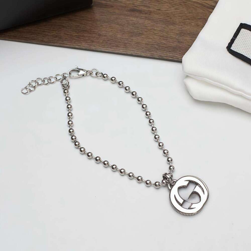 Luxury classic style stainless steel double G pendant bracelet women's and men's fashion bead chain adjustable wristband