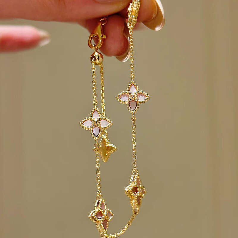 Four Pointed Star Pattern Bracelet Designer Bracelet Featuring Handcrafted Mother-of-Pearl Floral Motifs Exquisite Women's Jewelry
