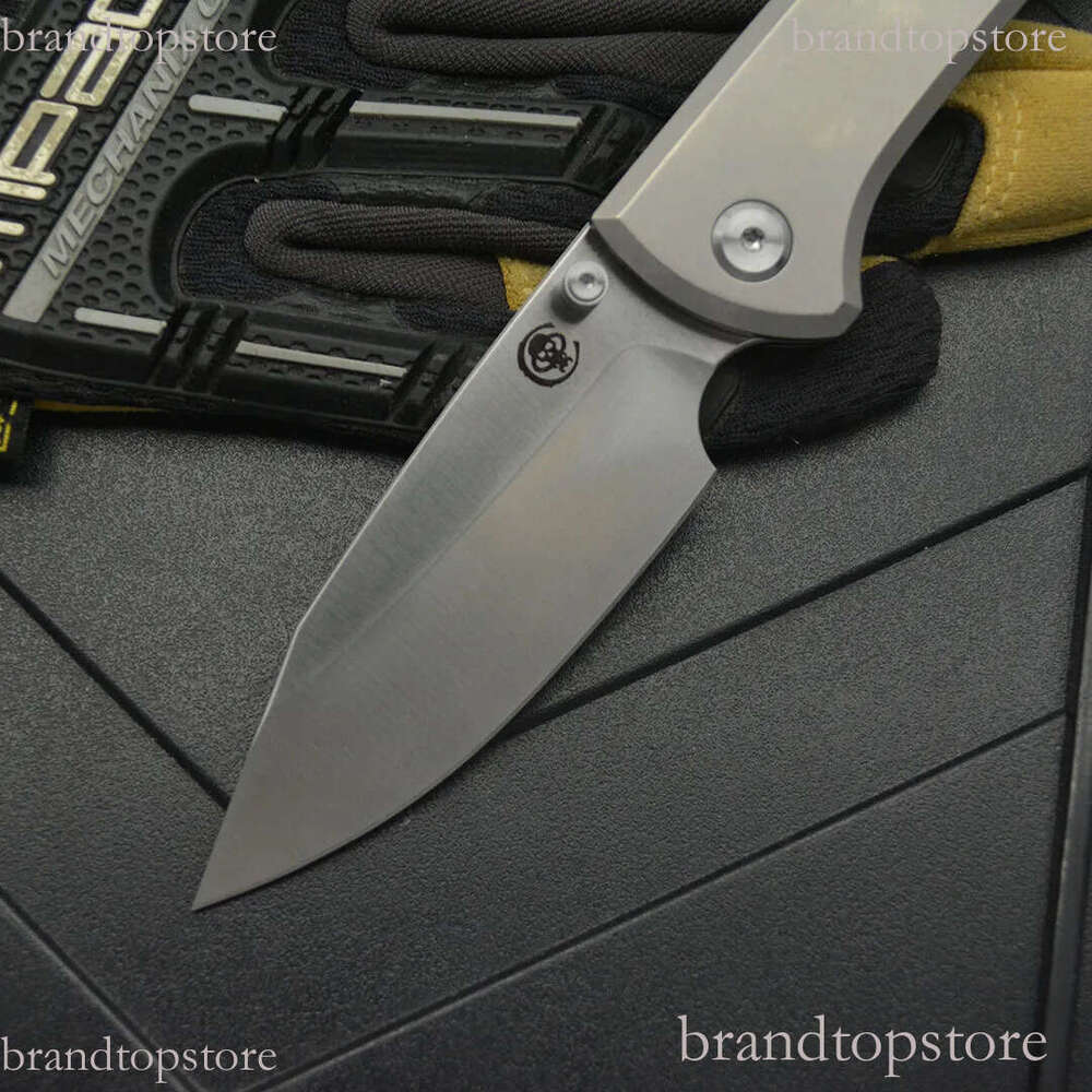 2Models Edition Chaves Folding Knife 3.23 M390 Satin Clip Point Blade, Titanium Handles