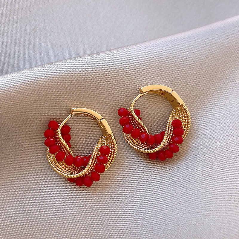 New crystal bead twisted ear buckle, personalized fashion design, niche temperament earrings, light luxury high-end earrings