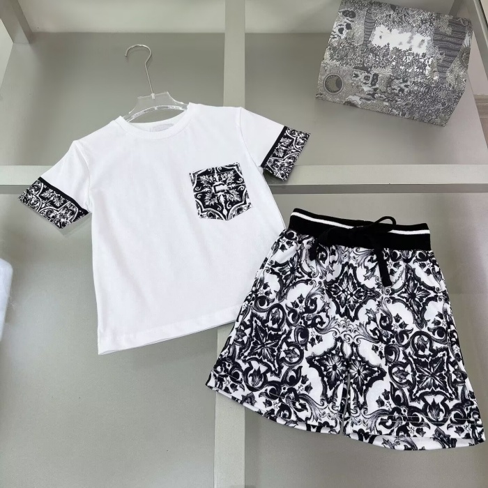 Designer children's and adults' retro floral cotton sets for summer fashion. Sleeveless t-shirts and matching loose shorts. Children's girls' and boys' clothing a2