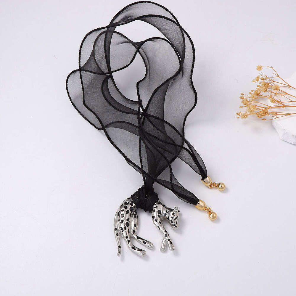 European And American Retro Wild Alloy Drip Oil Exaggerated Cheetah Ribbon Tie Sweater Chain Pendant Necklace