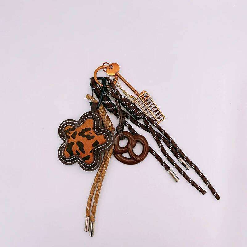 Matte Leopard Print Flower Bag Hanging Exquisite DIY Braided Rope Car Keychain Key Chains for Women XJ260106