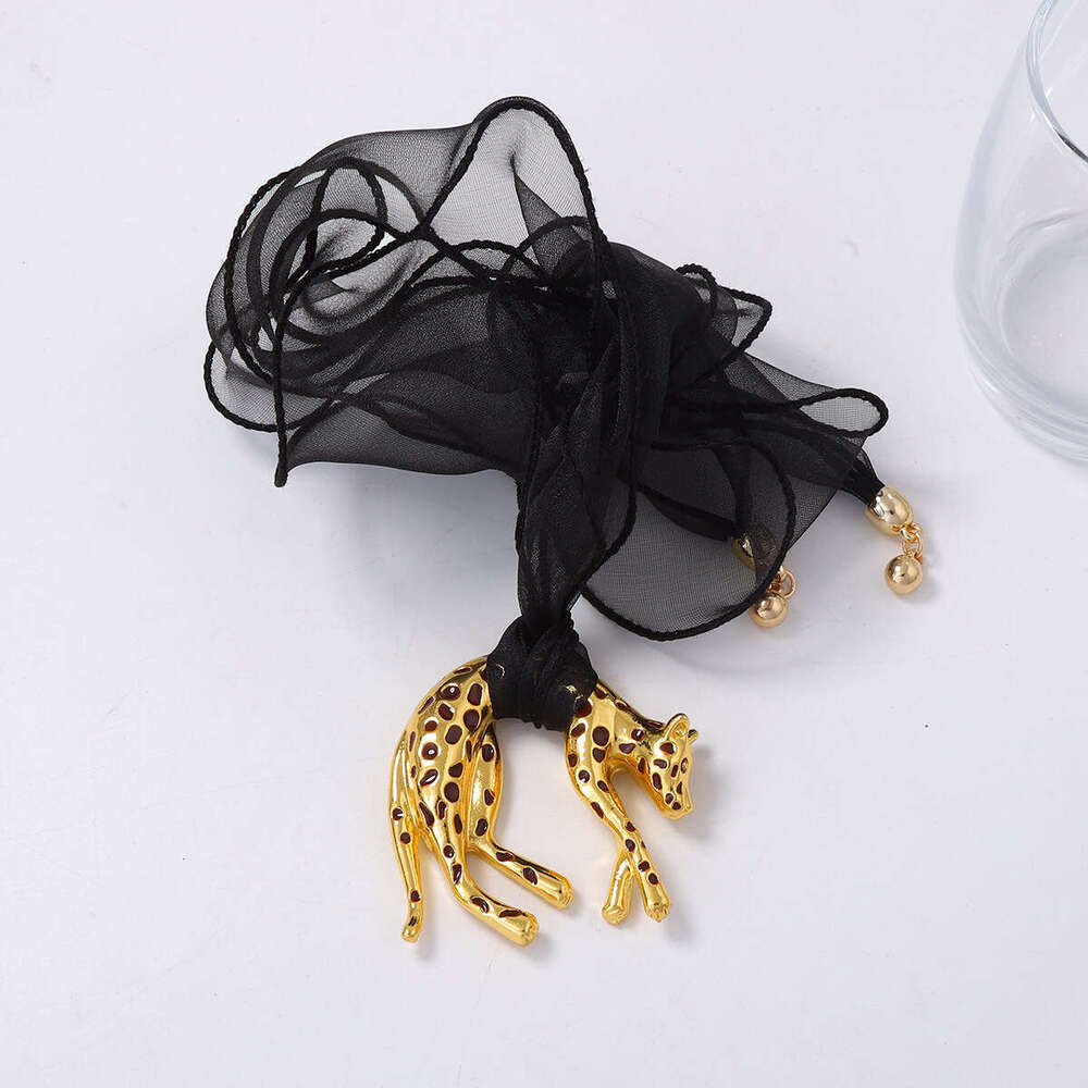 European And American Retro Wild Alloy Drip Oil Exaggerated Cheetah Ribbon Tie Sweater Chain Pendant Necklace