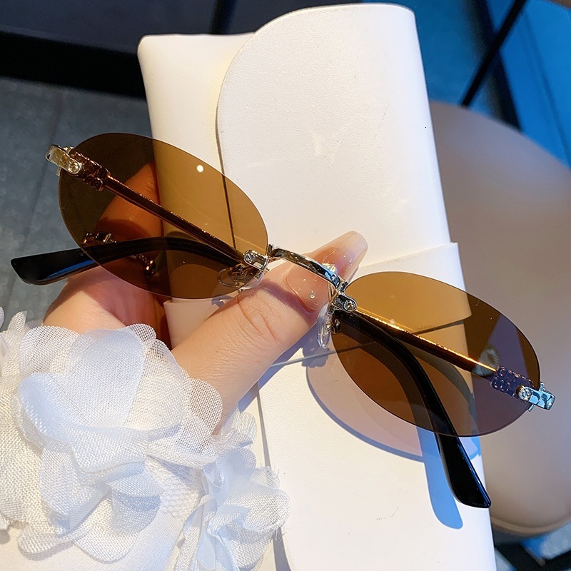 Frameless Oval 2025 New European and American Style Retro Sunglasses Trendy Concave Shape Elegant Hot Girl