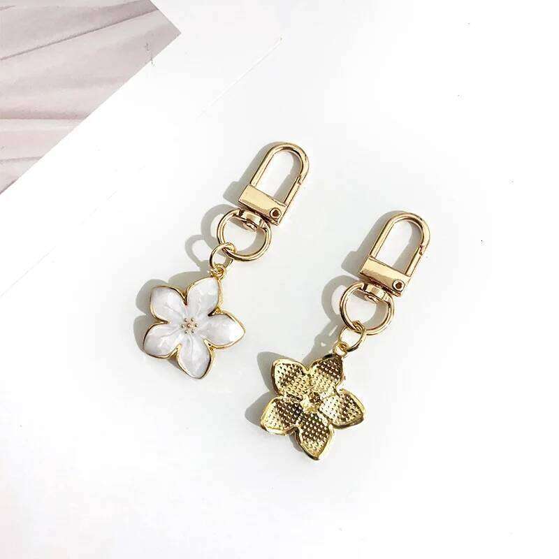 Lovely Sakura Flower Keychain Charm Enamel Pink White Black Women Bag Charms Key Ring Accessories XJ260106