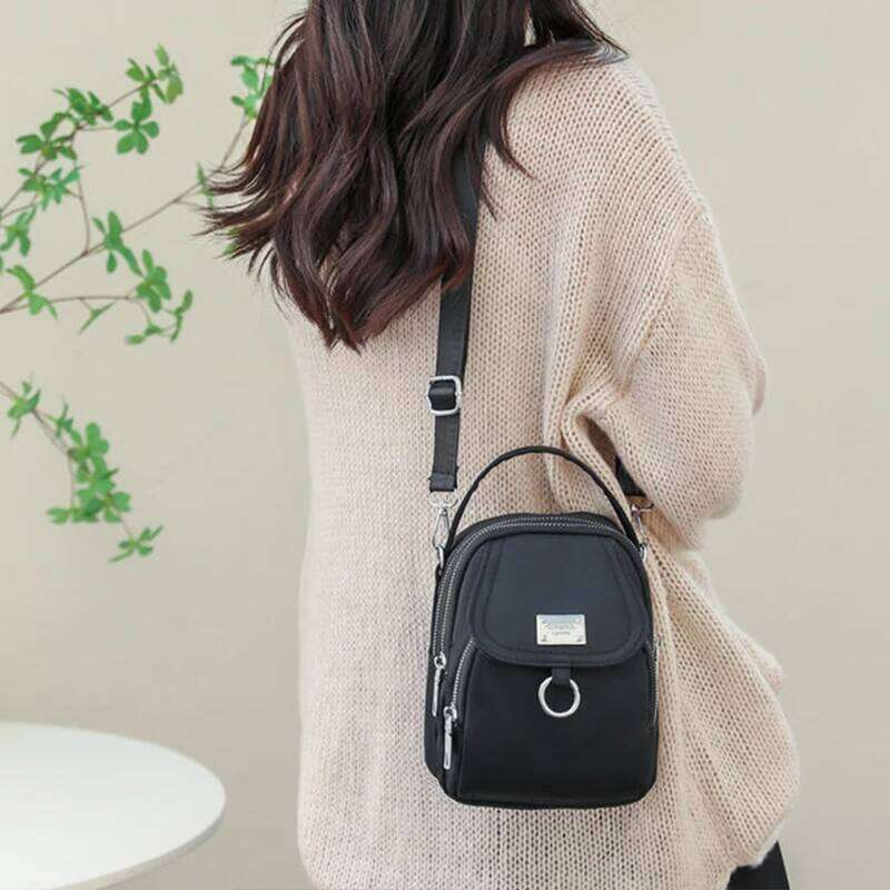 Neutral Style Shoulder Men Women, Suitable for Travel and Photography It Is a Cross-Body Bag Made of Oxford Fabric.