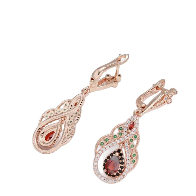 A pair of Bohemian style copper earrings with artificial zirconia inlay, European and American cross-border water droplet earrings