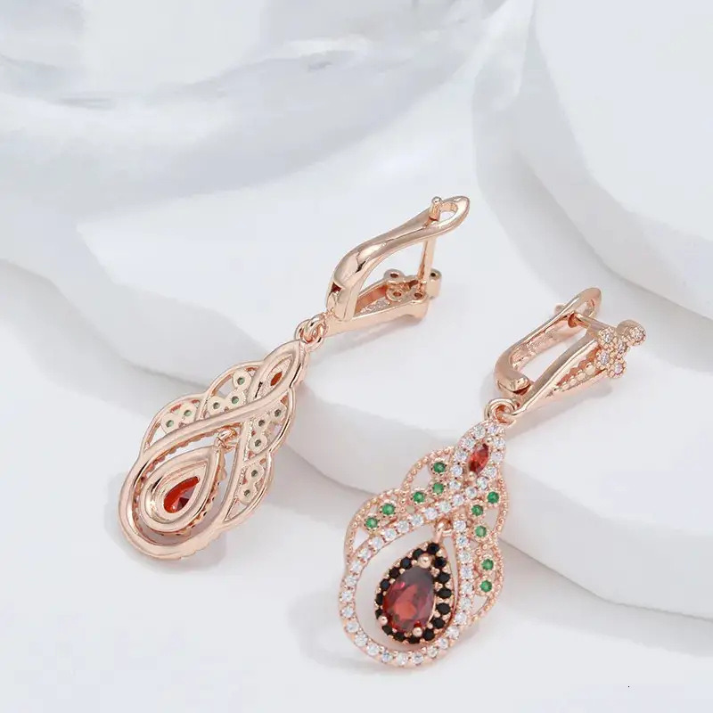 A pair of Bohemian style copper earrings with artificial zirconia inlay, European and American cross-border water droplet earrings