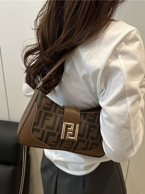 Vintage Printed Textured Underarm Bag Letter Handbag Versatile Commutin Baguette French Retro Niche PU Underarm for Women New Fashion g Textured Shoulder Bag 6c