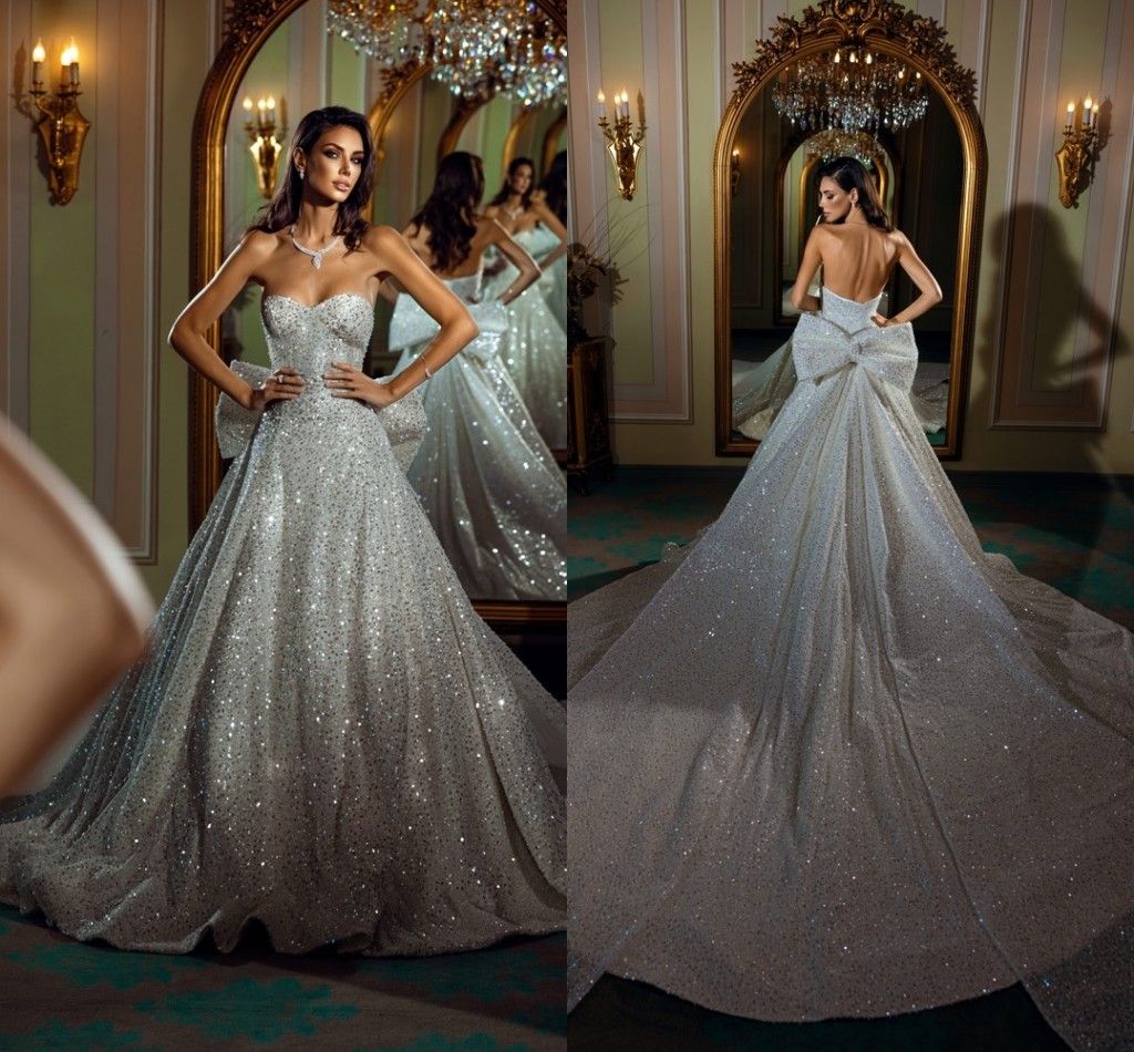 Shiny Ivory Sequined A Line Wedding Dresses Sweetheart Long Court Train Bridal Gowns With Bowknot Arabic Dubai Sexy Backless Bride Wedding Reception Dress